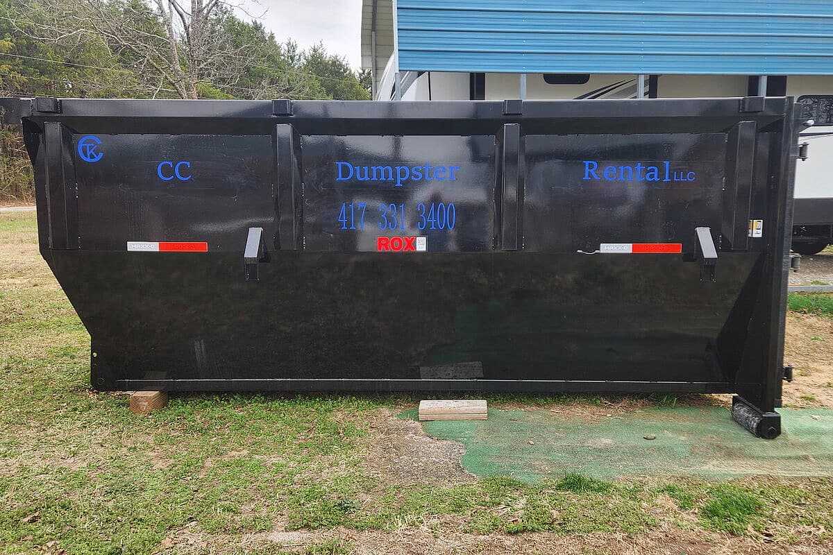 CC Dumpster Rental service truck and roll-off dumpster